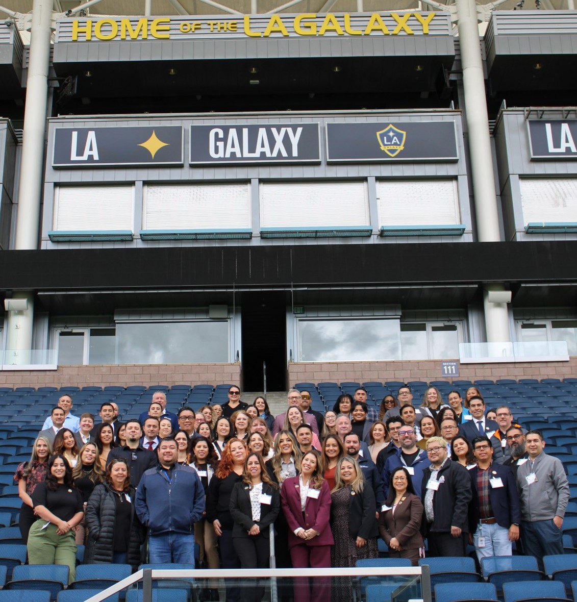 Group Picture with Sign